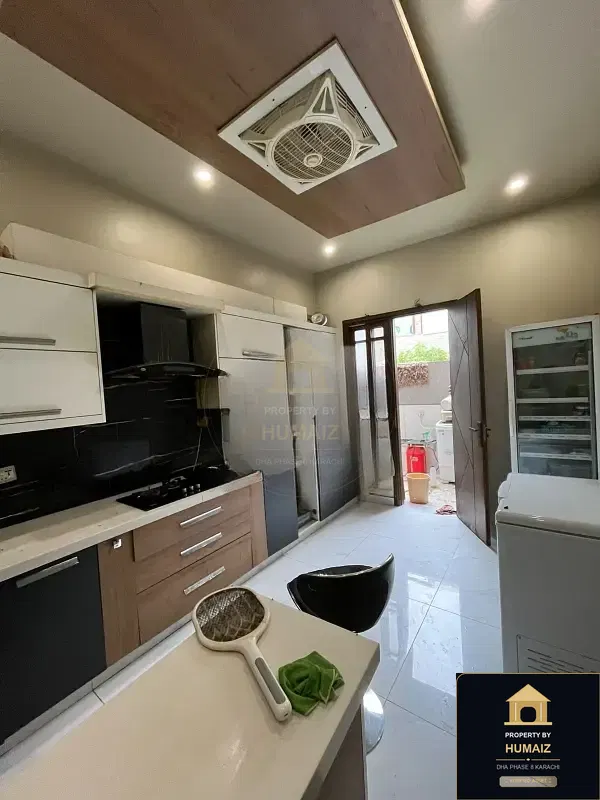 150 Sq. Yd. 4-Bedroom Luxury Villa (Basement, 4 Bath, Residence 1) in DHA Phase 8 For Rent in DHA Phase 8 Karachi — Photograph 9