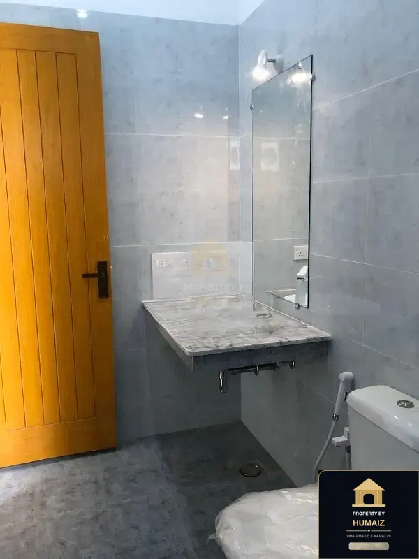 300 Sq. Yd. 6-Bedroom Luxury Villa (Basement, 6 Bath, Residence 2) in Khayaban-e-Sahil For Sale in DHA Phase 8 Karachi — Photograph 3