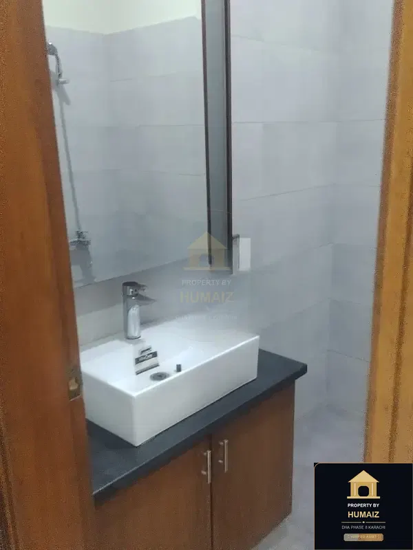 100 Sq. Yd. 4-Bedroom Luxury Villa (Basement, 4 Bath, Residence 13) in DHA Phase 8 For Sale in DHA Phase 8 Karachi — Photograph 15