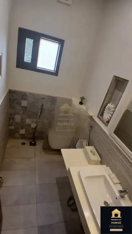 1,000 Sq. Yd. 7-Bedroom Luxury Villa (Basement, 7 Bath, Residence 4) in DHA Phase 8 For Sale in DHA Phase 8 Karachi — Photograph 19