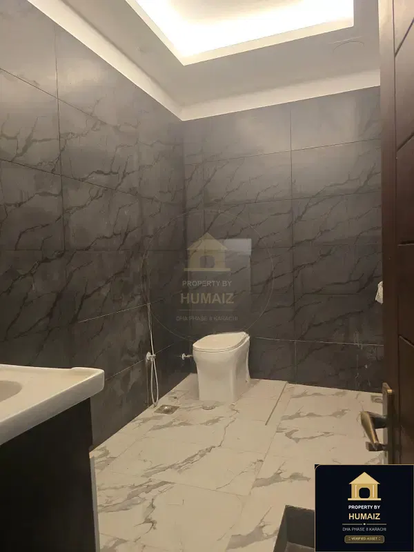 500 Sq. Yd. 6-Bedroom Luxury Villa (Basement, 7 Bath, Residence 44) in DHA Phase 8 For Sale in DHA Phase 8 Karachi — Photograph 4