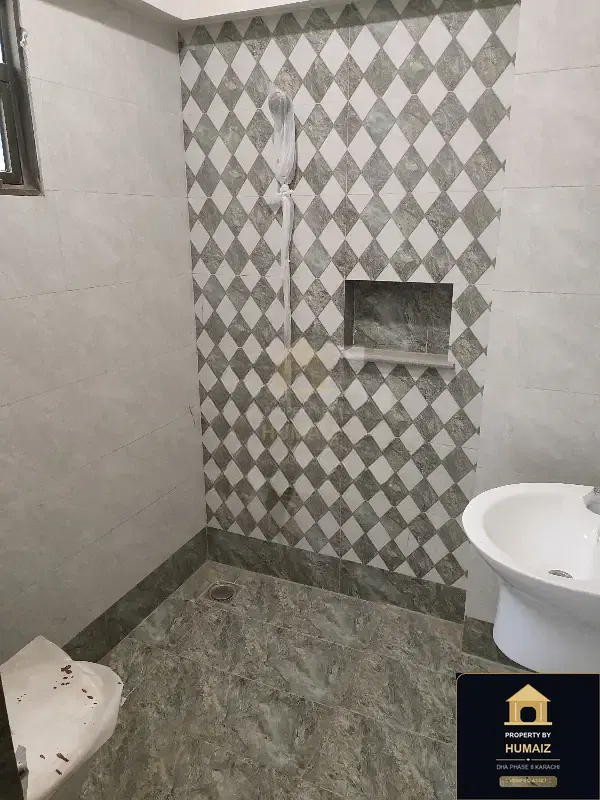4-Bedroom Luxury Apartment (Basement, 5 Bath, Suite 1) in DHA Phase 8 For Sale in DHA Phase 8 Karachi — Photograph 6