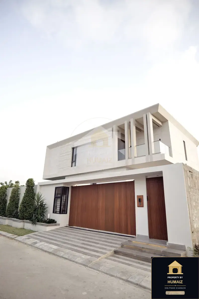 1,000 Sq. Yd. 7-Bedroom Luxury Villa in Khayaban-e-Bahria For Sale in DHA Phase 8 Karachi — Photograph 2