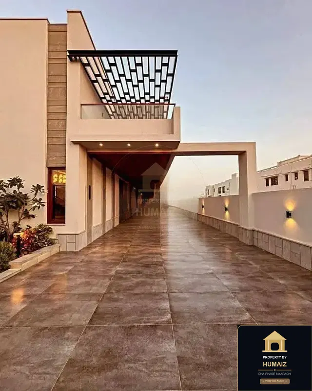 1,000 Sq. Yd. 6-Bedroom Luxury Villa (Private Pool, 7 Bath, Residence 1) in DHA Phase 8 For Rent in DHA Phase 8 Karachi — Photograph 2