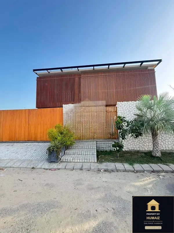 666 Sq. Yd. 5-Bedroom Luxury Villa (Boulevard Facing, 6 Bath, Residence 2) in Zone A For Sale in DHA Phase 8 Karachi — Photograph 2