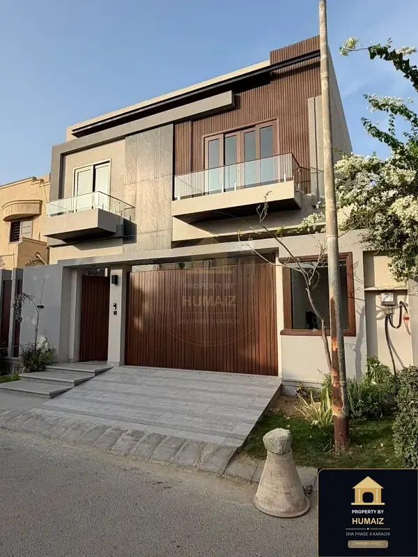 1,000 Sq. Yd. 10-Bedroom Luxury Villa (Basement, 6 Bath, Residence 3) in Zone A For Sale in DHA Phase 8 Karachi — Photograph 2