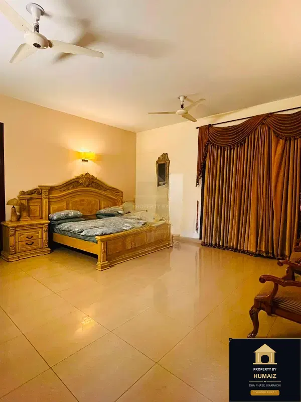 1,000 Sq. Yd. 6-Bedroom Luxury Villa (7 Bath, Residence 18) in DHA Phase 8 For Rent in DHA Phase 8 Karachi — Photograph 6