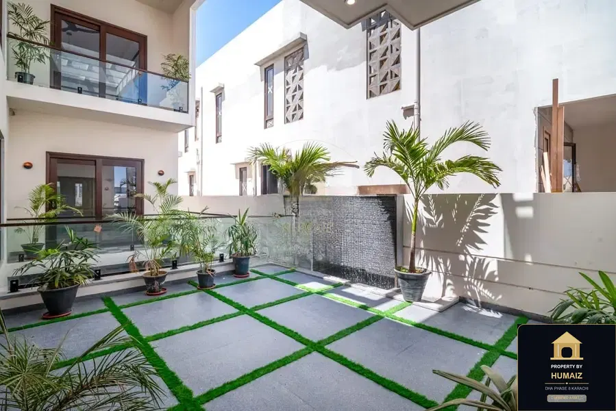 1,000 Sq. Yd. 7-Bedroom Luxury Villa (Basement, 7 Bath, Residence 1) in Zone A For Sale in DHA Phase 8 Karachi — Photograph 2