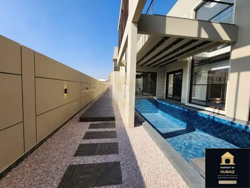1,000 Sq. Yd. 7-Bedroom Luxury Villa on Khayaban-e-Ittehad For Sale in DHA Phase 8 Karachi — Photograph 6
