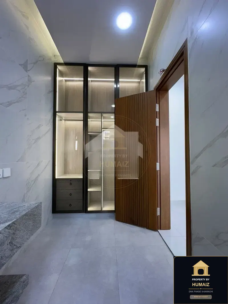 1,000 Sq. Yd. 5-Bedroom Luxury Villa (West Open, 6 Bath, Residence 1) in Zone A For Sale in DHA Phase 8 Karachi — Photograph 9