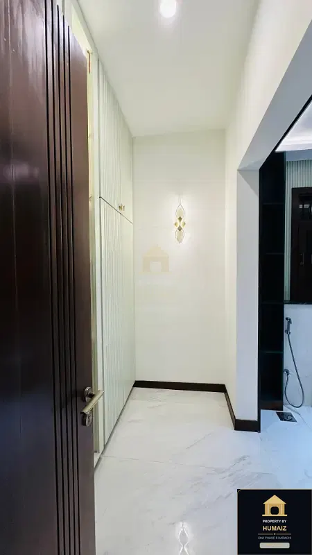 1,000 Sq. Yd. 6-Bedroom Luxury Villa (Basement, 7 Bath, Residence 5) in Zone A For Sale in DHA Phase 8 Karachi — Photograph 34