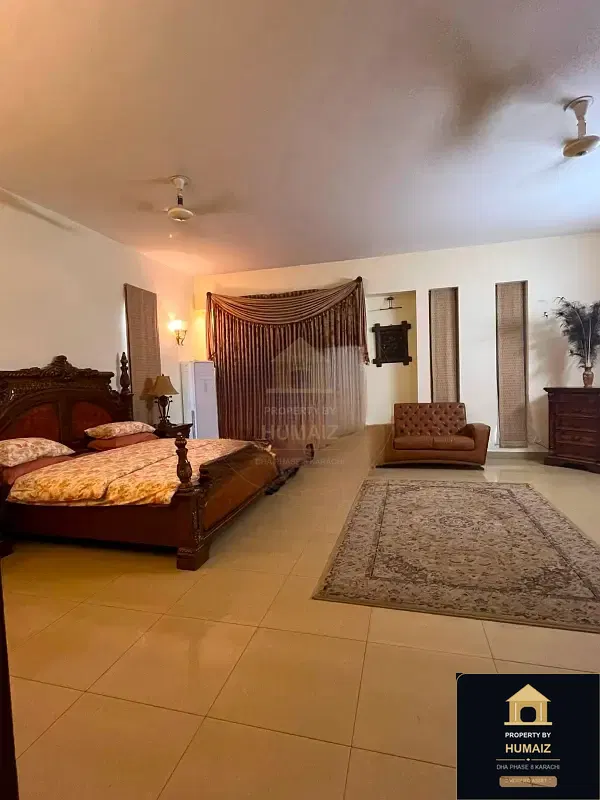 1,000 Sq. Yd. 6-Bedroom Luxury Villa (7 Bath, Residence 18) in DHA Phase 8 For Rent in DHA Phase 8 Karachi — Photograph 10