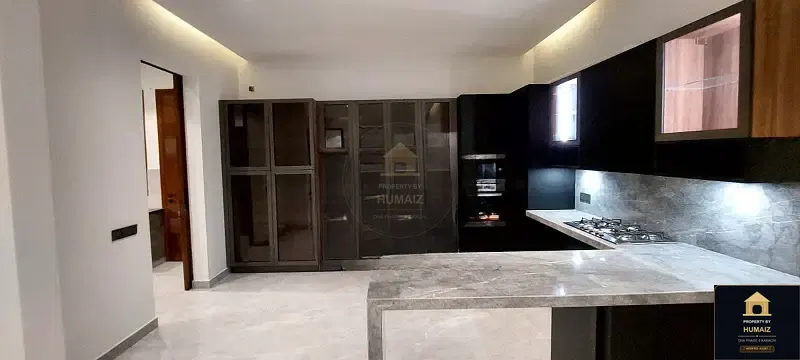 500 Sq. Yd. 6-Bedroom Luxury Villa (Private Pool, 6 Bath, Residence 1) in DHA Phase 8 For Rent in DHA Phase 8 Karachi — Photograph 11