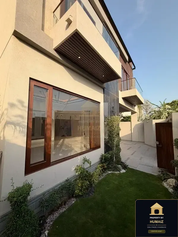 1,000 Sq. Yd. 10-Bedroom Luxury Villa (Basement, 6 Bath, Residence 2) in Zone A For Sale in DHA Phase 8 Karachi — Photograph 7