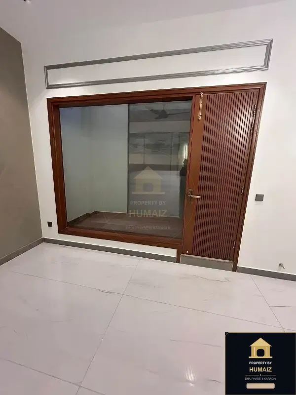 500 Sq. Yd. 6-Bedroom Luxury Villa in Zone C For Sale in DHA Phase 8 Karachi — Photograph 9