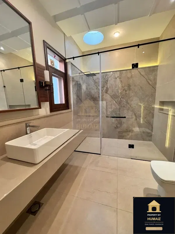 1,000 Sq. Yd. 6-Bedroom Luxury Villa (Private Pool, 6 Bath, Residence 12) in Zone A For Sale in DHA Phase 8 Karachi — Photograph 9