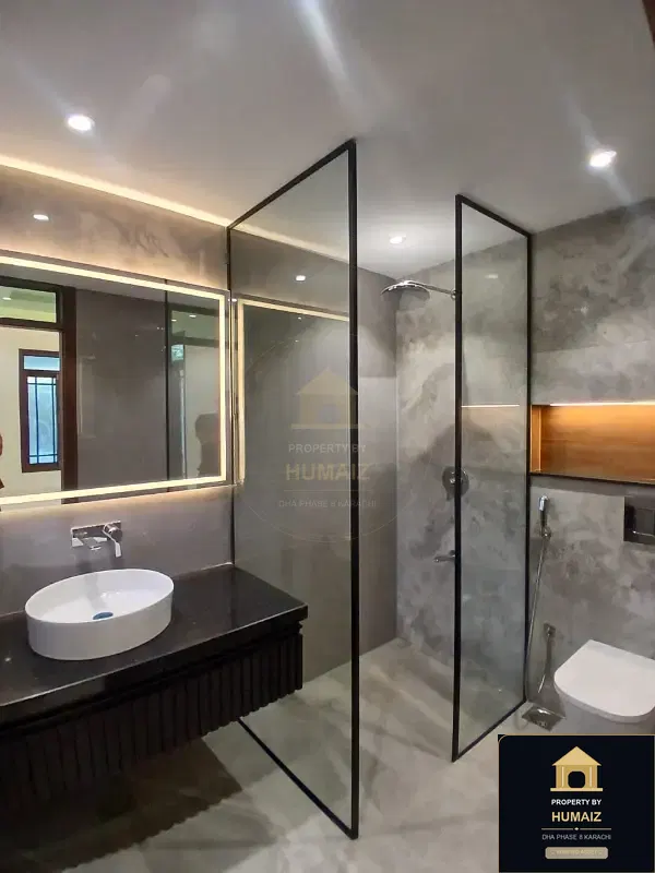 666 Sq. Yd. 5-Bedroom Luxury Villa (Basement, 6 Bath, Residence 1) in Zone A For Sale in DHA Phase 8 Karachi — Photograph 4