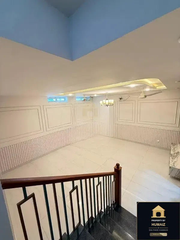 100 Sq. Yd. 4-Bedroom Luxury Villa (Basement, 4 Bath, Residence 3) in Zone B For Sale in DHA Phase 8 Karachi — Photograph 11