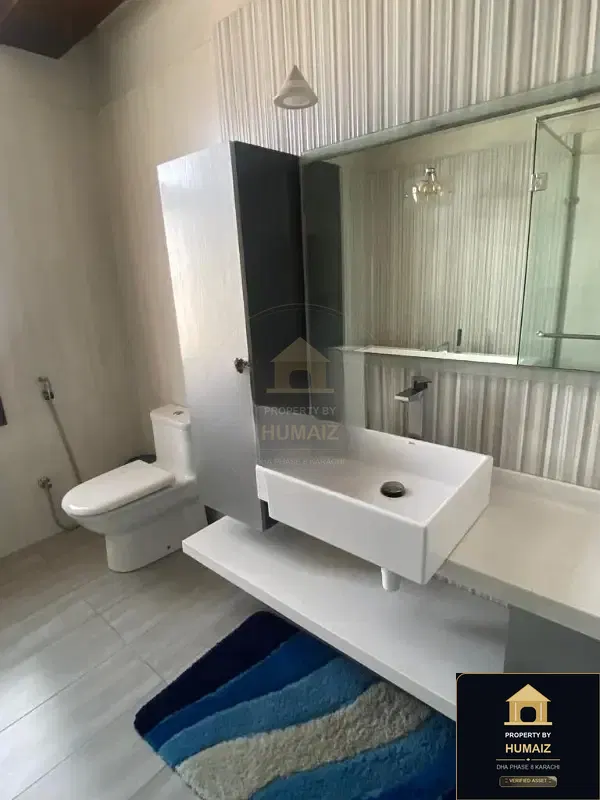 1,000 Sq. Yd. 5-Bedroom Luxury Villa (6 Bath, Residence 2) in DHA Phase 8 For Rent in DHA Phase 8 Karachi — Photograph 6