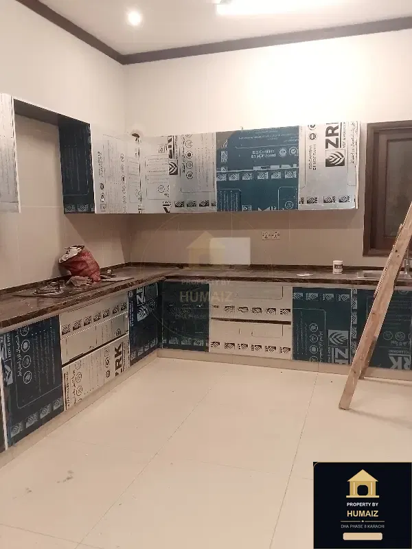 500 Sq. Yd. 6-Bedroom Luxury Villa (6 Bath, Residence 1) in Khayaban-e-Tariq For Rent in DHA Phase 8 Karachi — Photograph 3