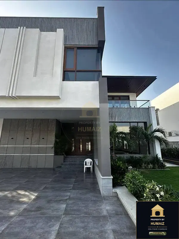 1,000 Sq. Yd. 6-Bedroom Luxury Villa on Qasim Street For Sale in DHA Phase 8 Karachi — Photograph 2