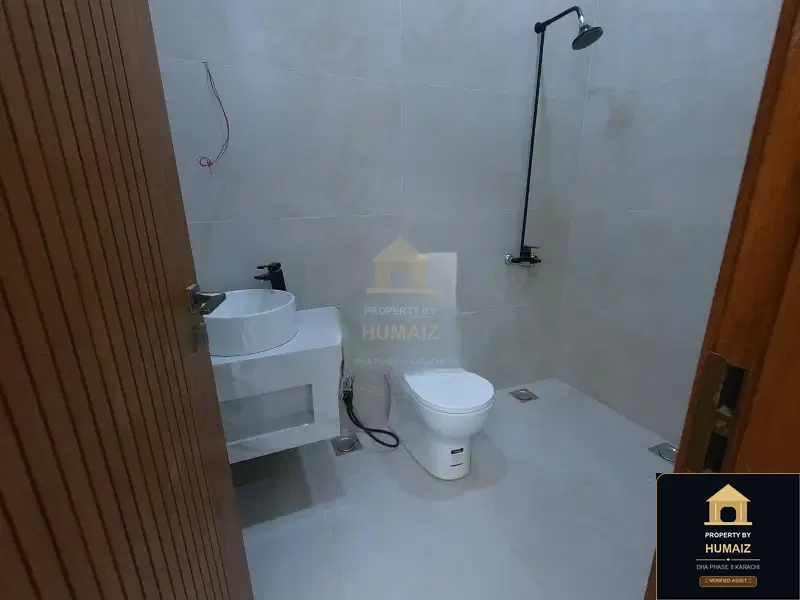 1,000 Sq. Yd. 11-Bedroom Luxury Villa in Zone A For Sale in DHA Phase 8 Karachi — Photograph 9