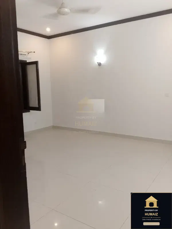 500 Sq. Yd. 6-Bedroom Luxury Villa (6 Bath, Residence 1) in Khayaban-e-Tariq For Rent in DHA Phase 8 Karachi — Photograph 4