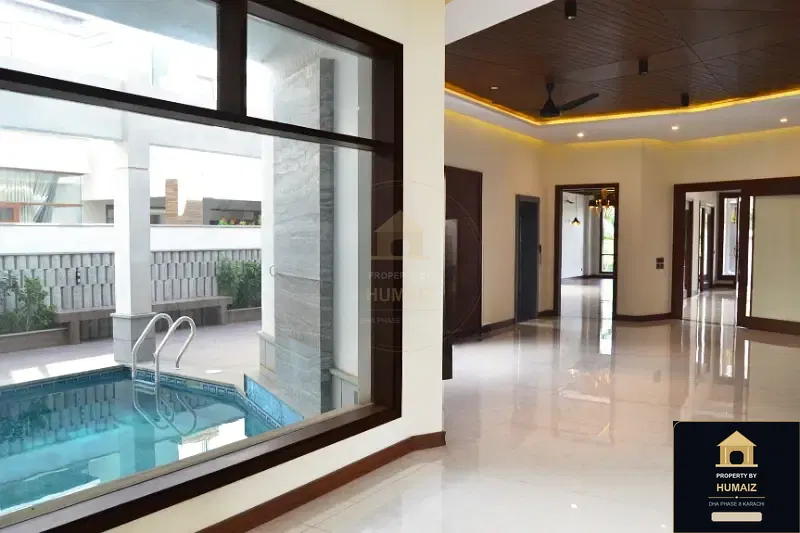 1,000 Sq. Yd. 6-Bedroom Luxury Villa (Basement, 7 Bath, Residence 58) in DHA Phase 8 For Sale in DHA Phase 8 Karachi — Photograph 13