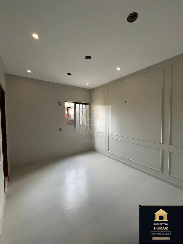 100 Sq. Yd. 3-Bedroom Luxury Villa (Basement, 4 Bath, Residence 7) in Khayaban-e-Iqbal For Sale in DHA Phase 8 Karachi — Photograph 4