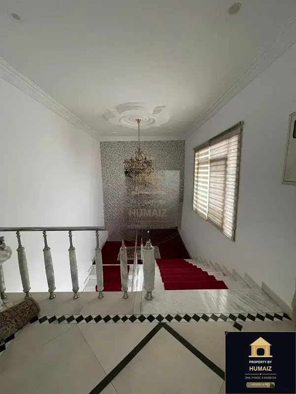 1,500 Sq. Yd. 5-Bedroom Luxury Villa on Zulfiqar Commercial For Sale in DHA Phase 8 Karachi — Photograph 7
