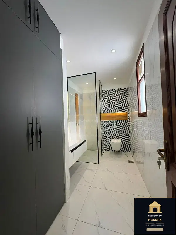 1,000 Sq. Yd. 6-Bedroom Luxury Villa (Basement, 6 Bath, Residence 60) in DHA Phase 8 For Sale in DHA Phase 8 Karachi — Photograph 6