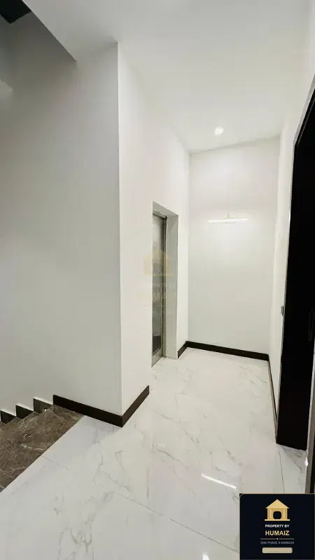 1,000 Sq. Yd. 6-Bedroom Luxury Villa (Basement, 7 Bath, Residence 5) in Zone A For Sale in DHA Phase 8 Karachi — Photograph 8