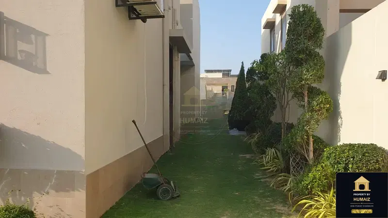 1,000 Sq. Yd. 6-Bedroom Luxury Villa (Basement, 6 Bath, Residence 2) in Zone A For Sale in DHA Phase 8 Karachi — Photograph 9