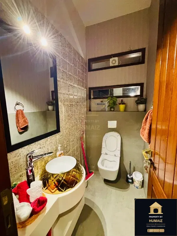 500 Sq. Yd. 6-Bedroom Luxury Villa (Basement, 7 Bath, Residence 11) in DHA Phase 8 For Sale in DHA Phase 8 Karachi — Photograph 4