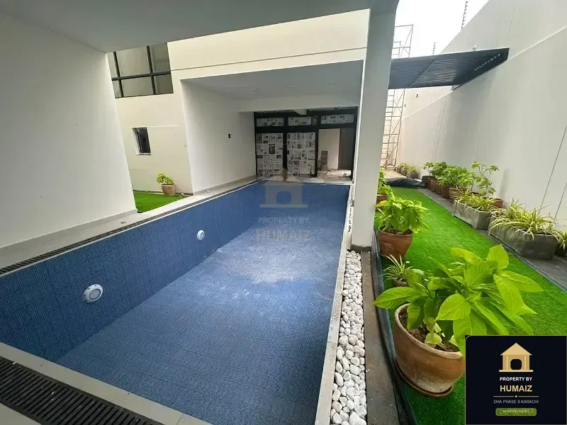 1,000 Sq. Yd. 6-Bedroom Luxury Villa (Private Pool, 6 Bath, Residence 3) on Zulfiqar Commercial For Sale in DHA Phase 8 Karachi — Photograph 4