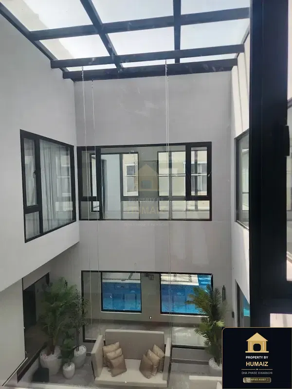 1,000 Sq. Yd. 6-Bedroom Luxury Villa (Basement, 6 Bath, Residence 1) in Khayaban-e-Iqbal For Sale in DHA Phase 8 Karachi — Photograph 7