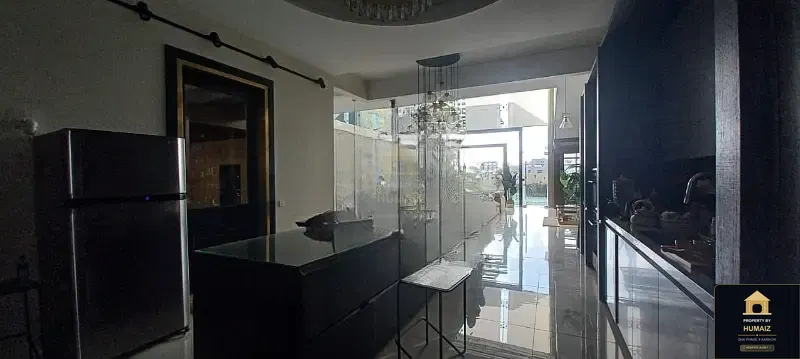 2,000 Sq. Yd. 8-Bedroom Luxury Villa (Private Pool, 7 Bath, Residence 2) in DHA Phase 8 For Sale in DHA Phase 8 Karachi — Photograph 6