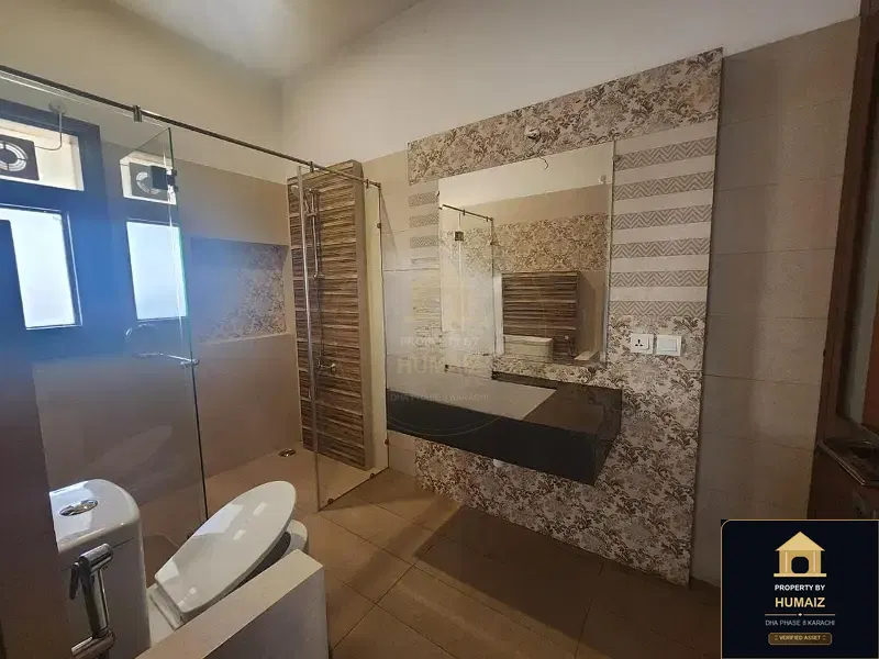 500 Sq. Yd. 6-Bedroom Luxury Villa (Basement, 7 Bath, Residence 5) in DHA Phase 8 For Rent in DHA Phase 8 Karachi — Photograph 4