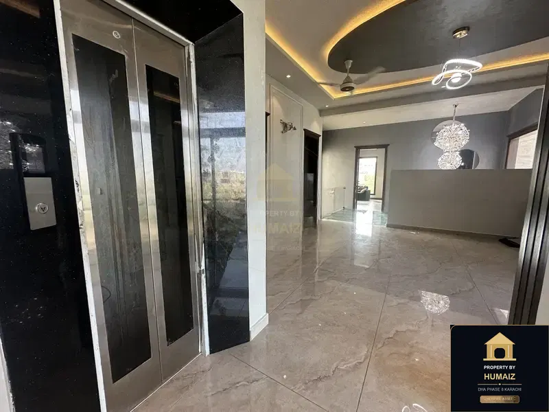 1,000 Sq. Yd. 9-Bedroom Luxury Villa on Khayaban-e-Iqbal For Sale in DHA Phase 8 Karachi — Photograph 11