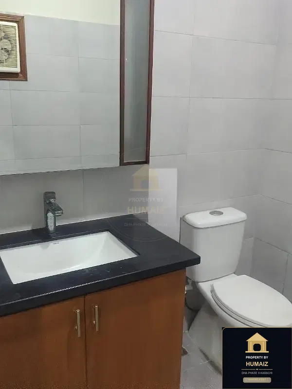100 Sq. Yd. 4-Bedroom Luxury Villa (Basement, 4 Bath, Residence 13) in DHA Phase 8 For Sale in DHA Phase 8 Karachi — Photograph 7