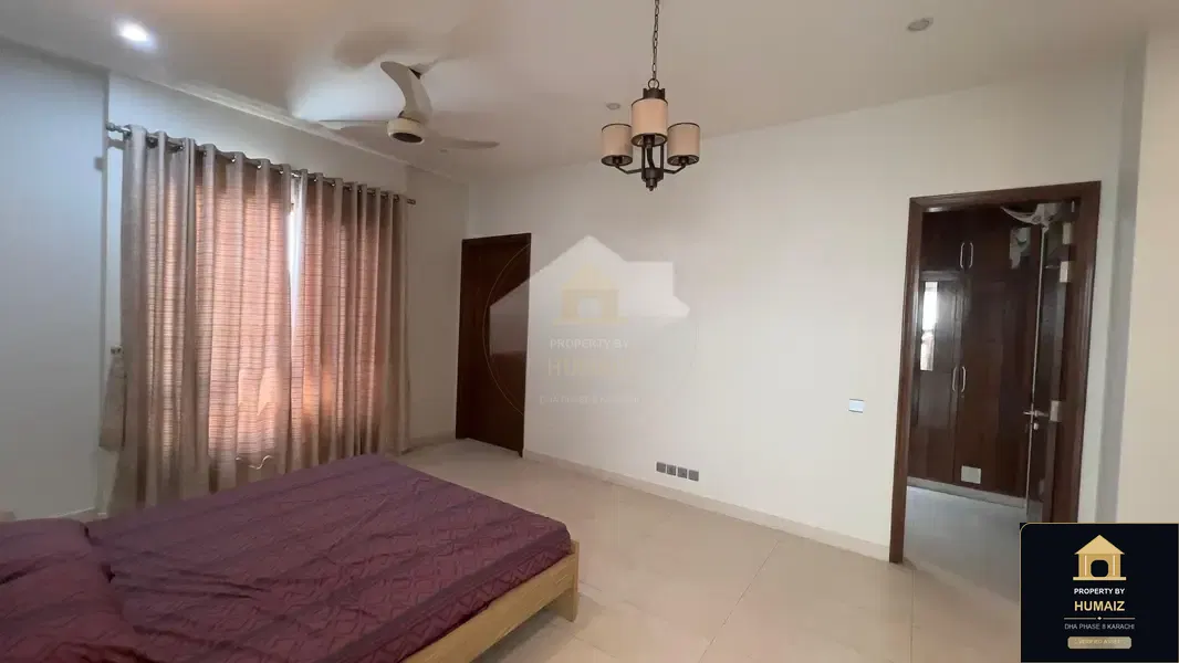 1,000 Sq. Yd. 4-Bedroom Luxury Villa in DHA Phase 8 For Rent in DHA Phase 8 Karachi — Photograph 14
