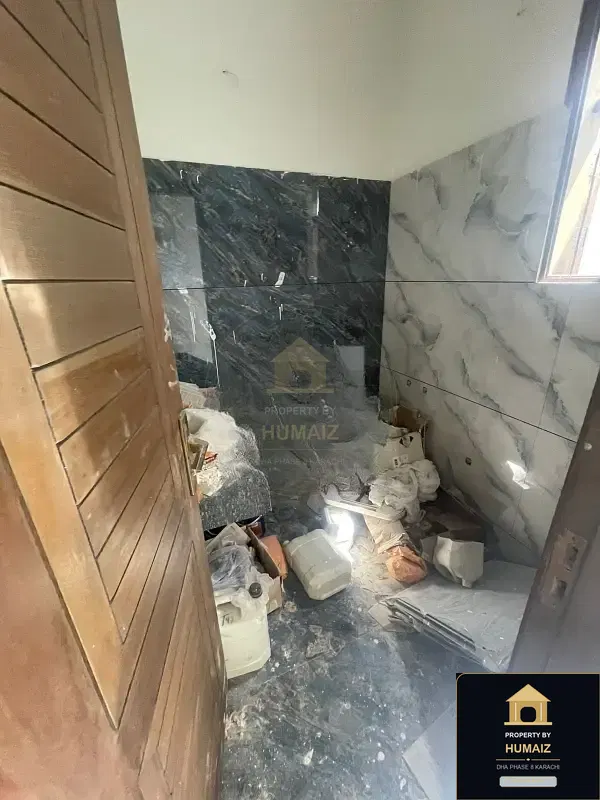 100 Sq. Yd. 3-Bedroom Luxury Villa (Basement, 4 Bath, Residence 2) in DHA Phase 8 For Sale in DHA Phase 8 Karachi — Photograph 11