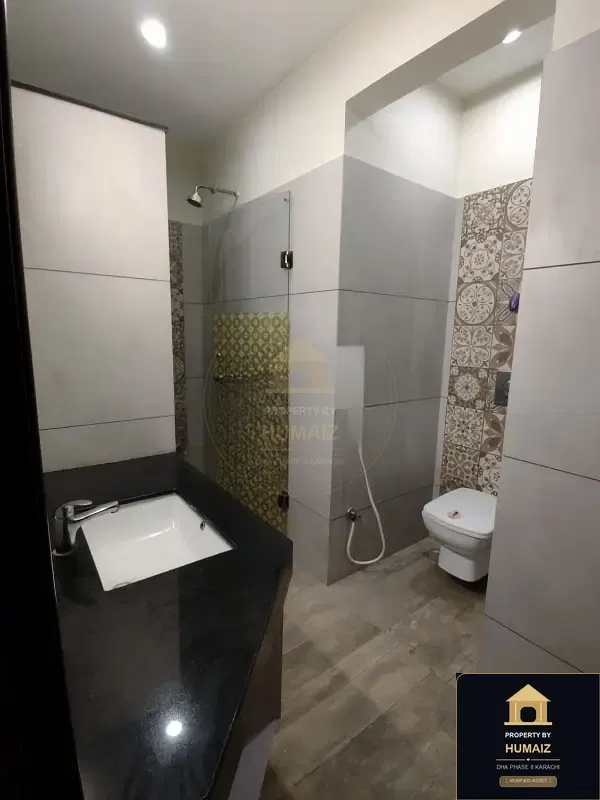 4-Bedroom Upper/Lower Portion (Basement, 5 Bath, Unit 13) in DHA Phase 8 For Rent in DHA Phase 8 Karachi — Photograph 10