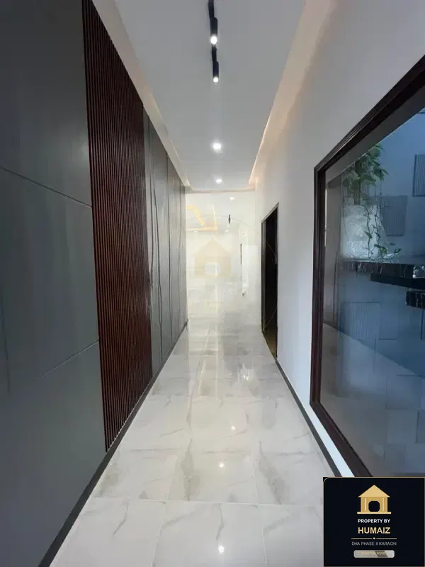 500 Sq. Yd. 6-Bedroom Luxury Villa (West Open, 7 Bath, Residence 1) in Khayaban-e-Shujaat For Sale in DHA Phase 8 Karachi — Photograph 12