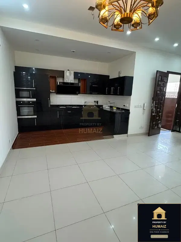 100 Sq. Yd. 4-Bedroom Luxury Villa (Basement, 4 Bath, Residence 2) in DHA Phase 8 For Rent in DHA Phase 8 Karachi — Photograph 2