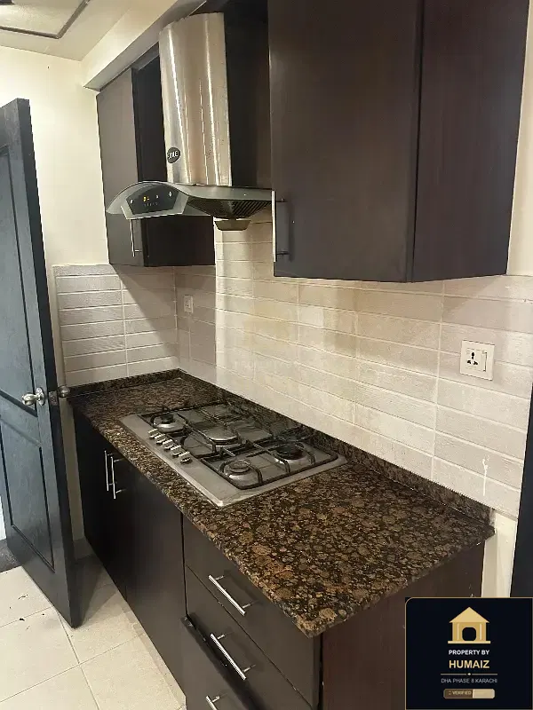 2,500 Sq. Yd. 3-Bedroom Luxury Villa at Coral Towers For Sale in DHA Phase 8 Karachi — Photograph 6