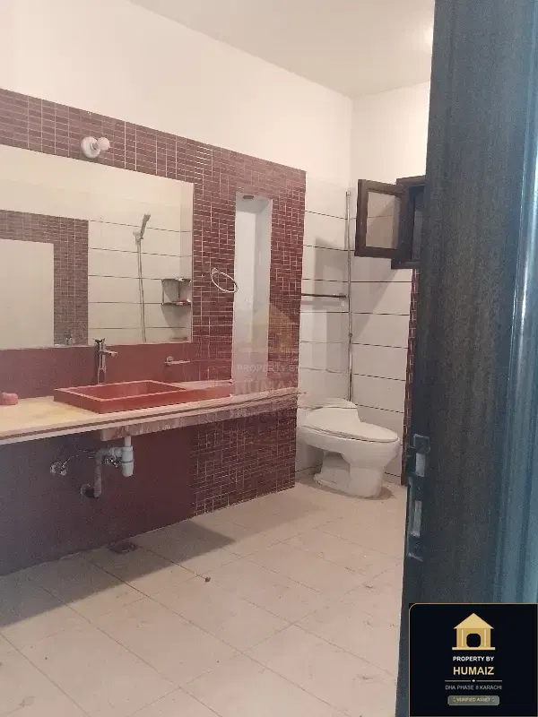 500 Sq. Yd. 6-Bedroom Luxury Villa (6 Bath, Residence 1) in Khayaban-e-Tariq For Rent in DHA Phase 8 Karachi — Photograph 6
