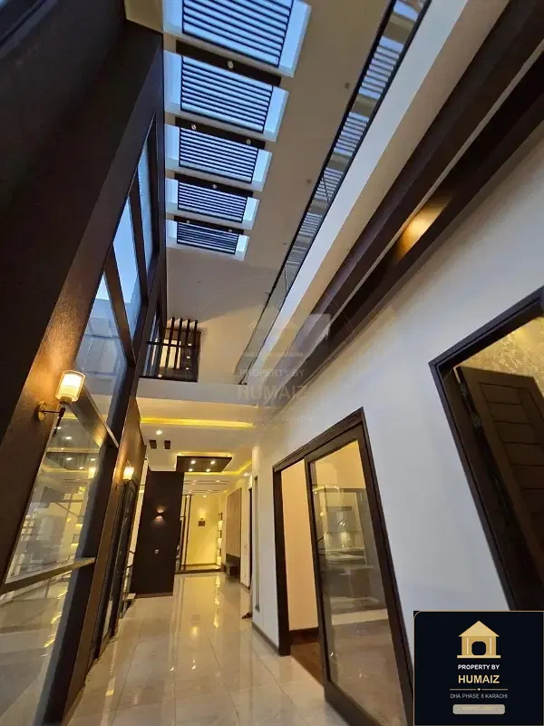 1,000 Sq. Yd. 7-Bedroom Luxury Villa (Basement, 7 Bath, Residence 2) in Khayaban-e-Ittehad For Sale in DHA Phase 8 Karachi — Photograph 6