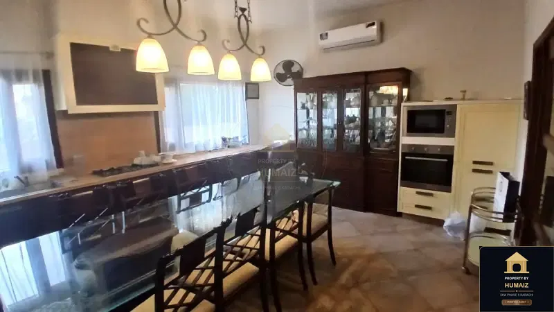 1,000 Sq. Yd. 7-Bedroom Luxury Villa (Basement, 7 Bath, Residence 6) in DHA Phase 8 For Sale in DHA Phase 8 Karachi — Photograph 11