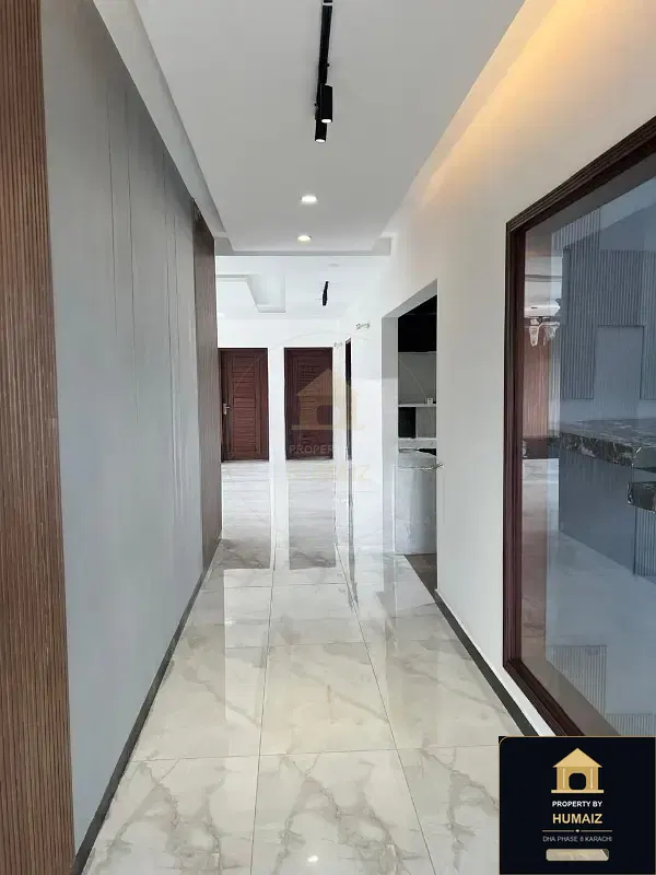 500 Sq. Yd. 6-Bedroom Luxury Villa (West Open, 6 Bath, Residence 3) in Khayaban-e-Shujaat For Sale in DHA Phase 8 Karachi — Photograph 4